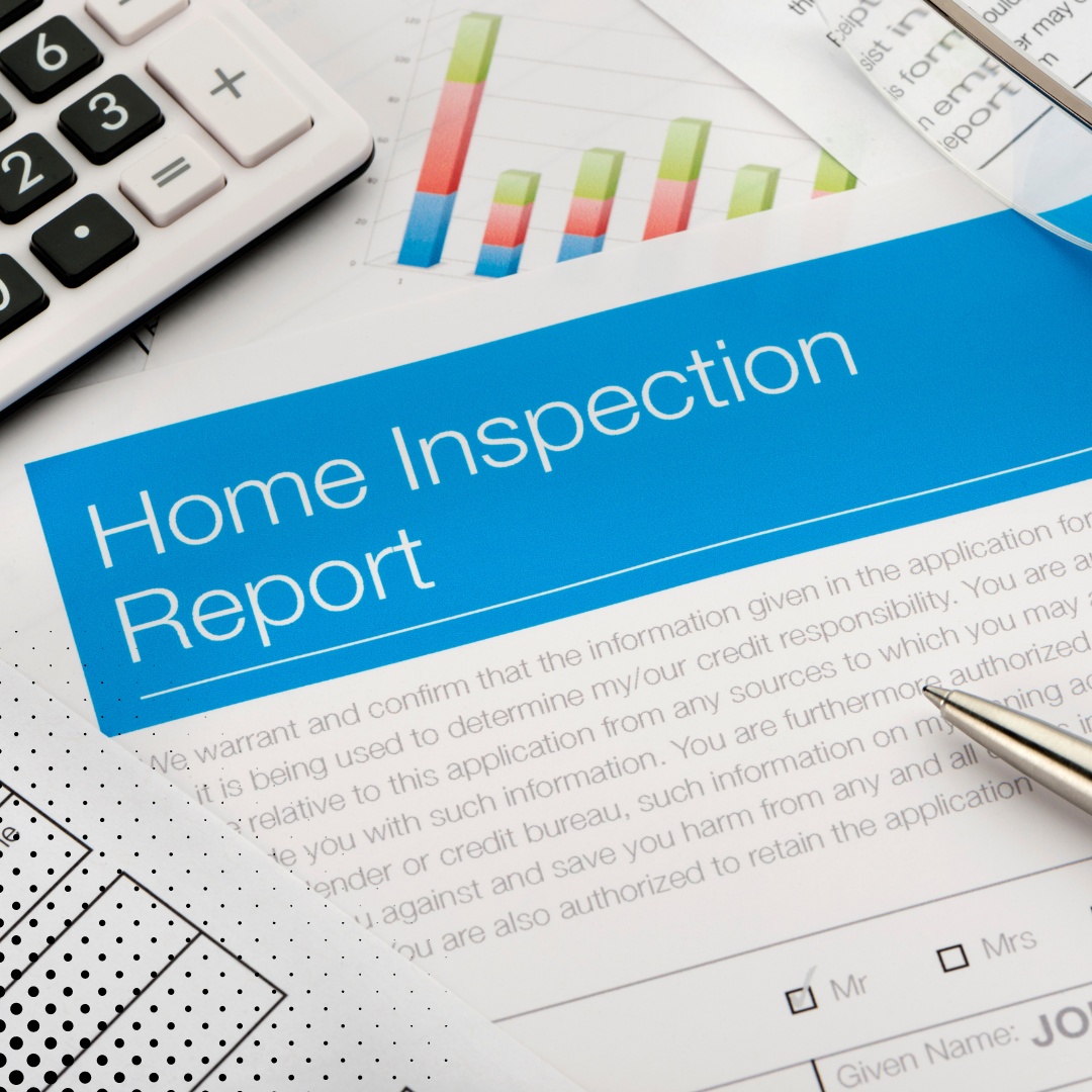 A "Home Inspection Report" document next to financial charts, a calculator, and a pen. 