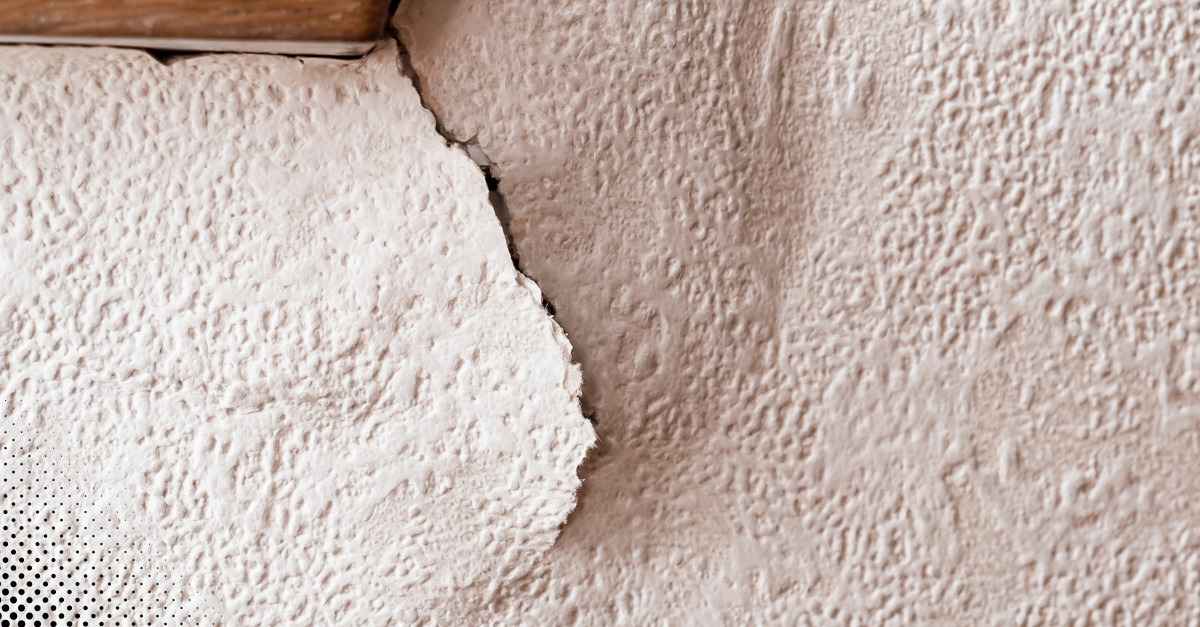 Wall crack near ceiling from possible moisture damage
